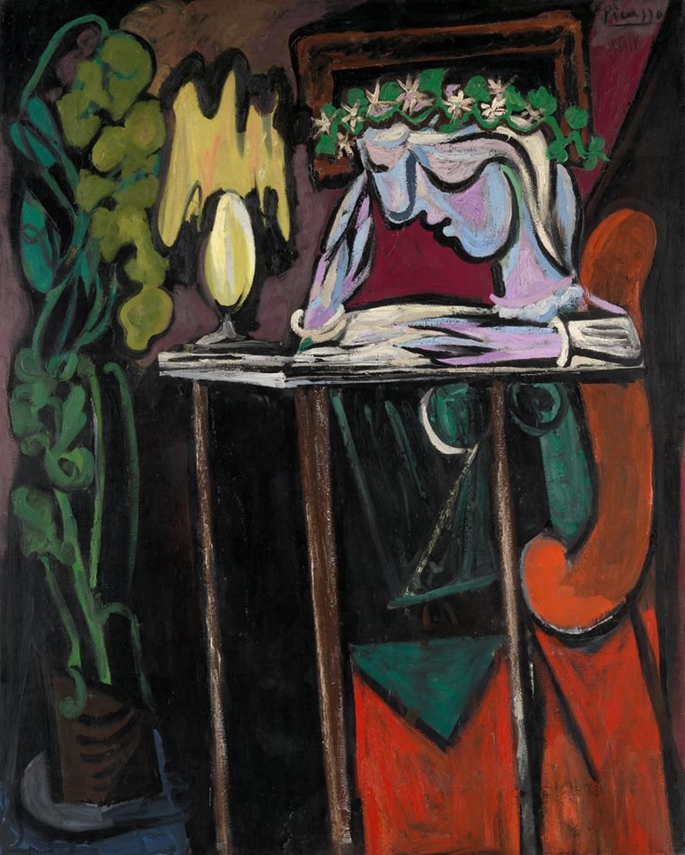 Pablo Picasso Reading At A Table - 1934